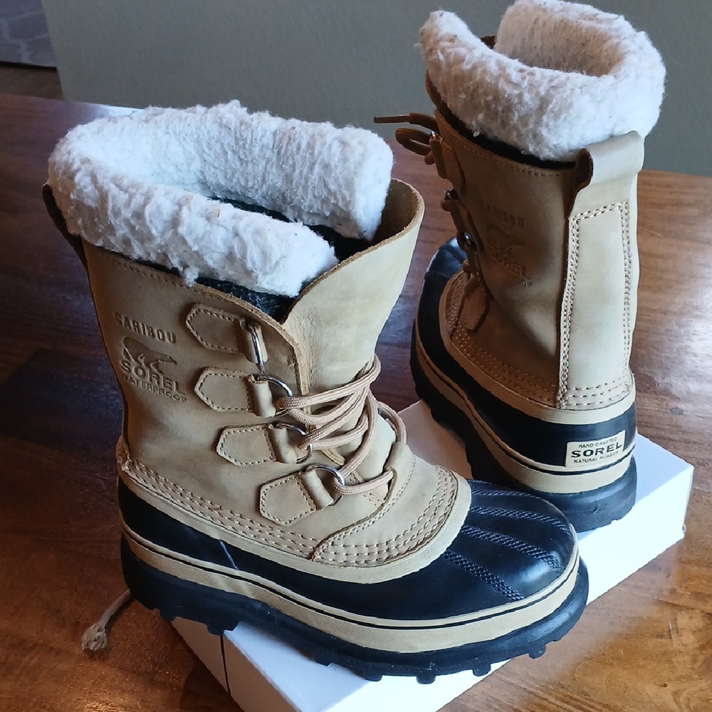 Sorel Tan and Black Rain & Snow Boots Waterproof Design. Worn, some staining